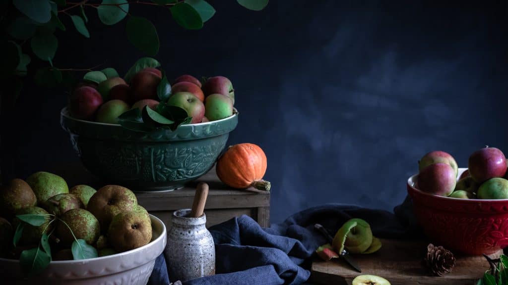 Three Mason Cash bowls of Autumnal fruits (apples and pears) ready for peeling and preserving. Image by Emma Lee - TheIrishmansWife.com