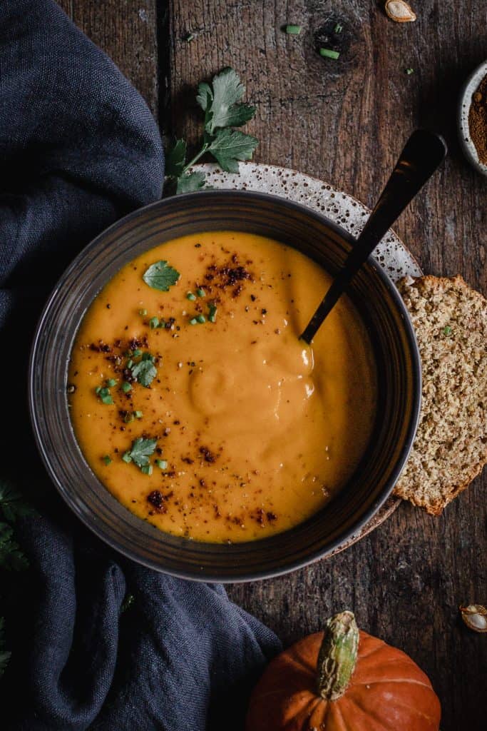 Close up of a bowl of butternut squash chipotle soup