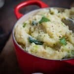creamy colcannon mash in a red Le Creuset pot