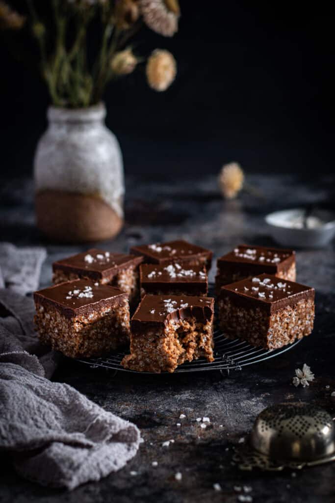 a round cooling tray full of Mars Bar slice squares