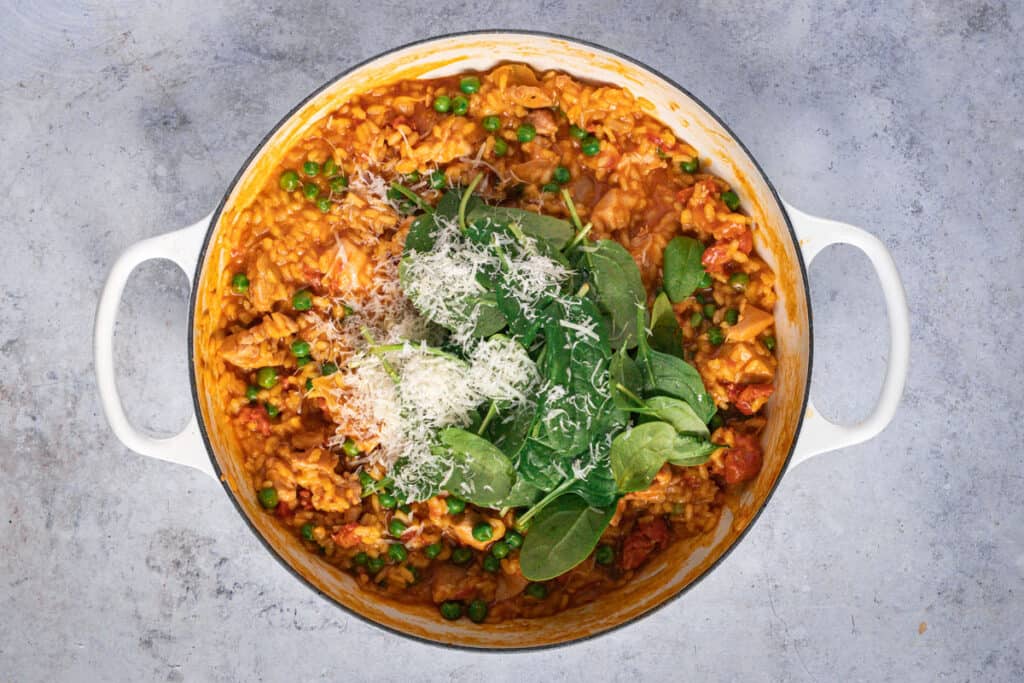 English spinach and parmesan are added to finish the risotto.
