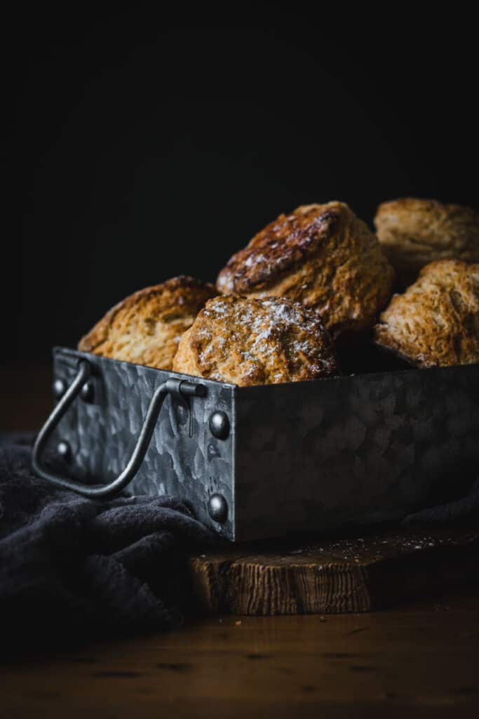A metal box of golden Irish buttermilk scones.