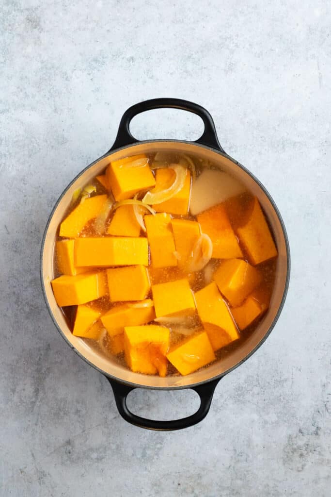 Add the water and bring to a simmer on the stove top.