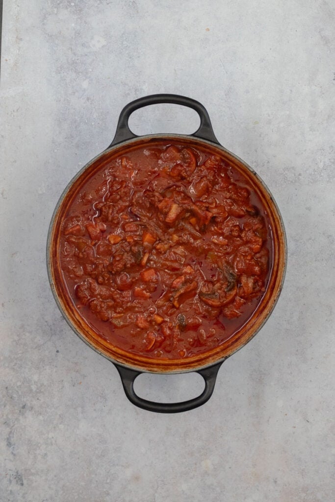 A slow cooked bolognese in a Dutch oven.