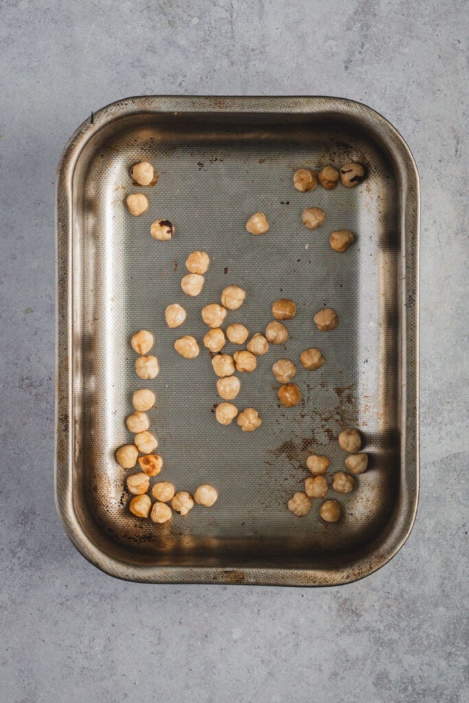 Hazelnuts roasted in a stainess steel pan,