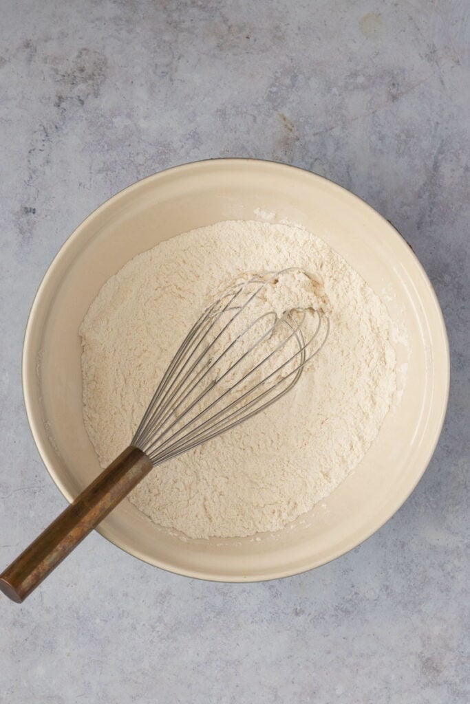 A bowl of dry ingredients that has been whisked to aerate the flour.