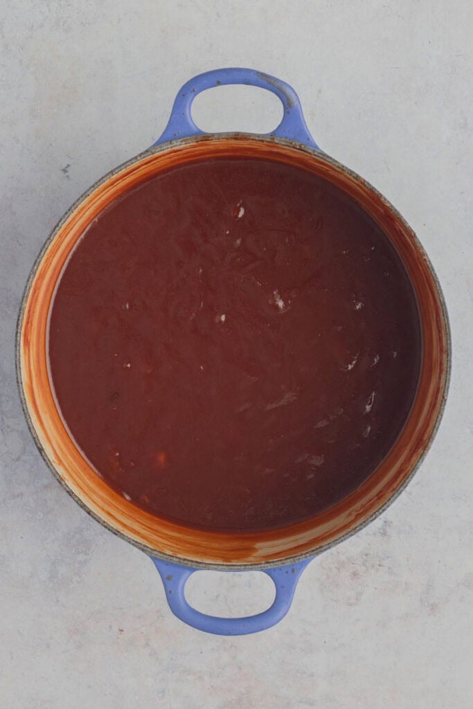A dutch oven of BBQ sauce.