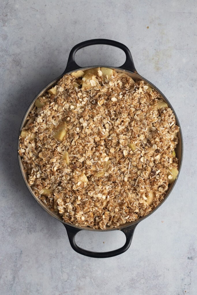 Skillet apple crumble ready for the oven.