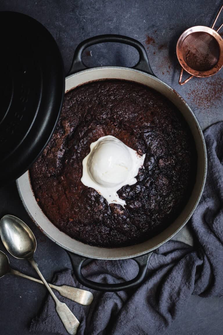 A chocolate self -saucing pudding cooked in an enamel Dutch oven.