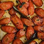Close up of a tray of honey roasted carrots.